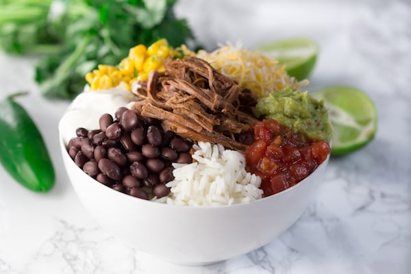 Slow Cooker Barbacoa Beef Burrito Bowls from greens and chocolate