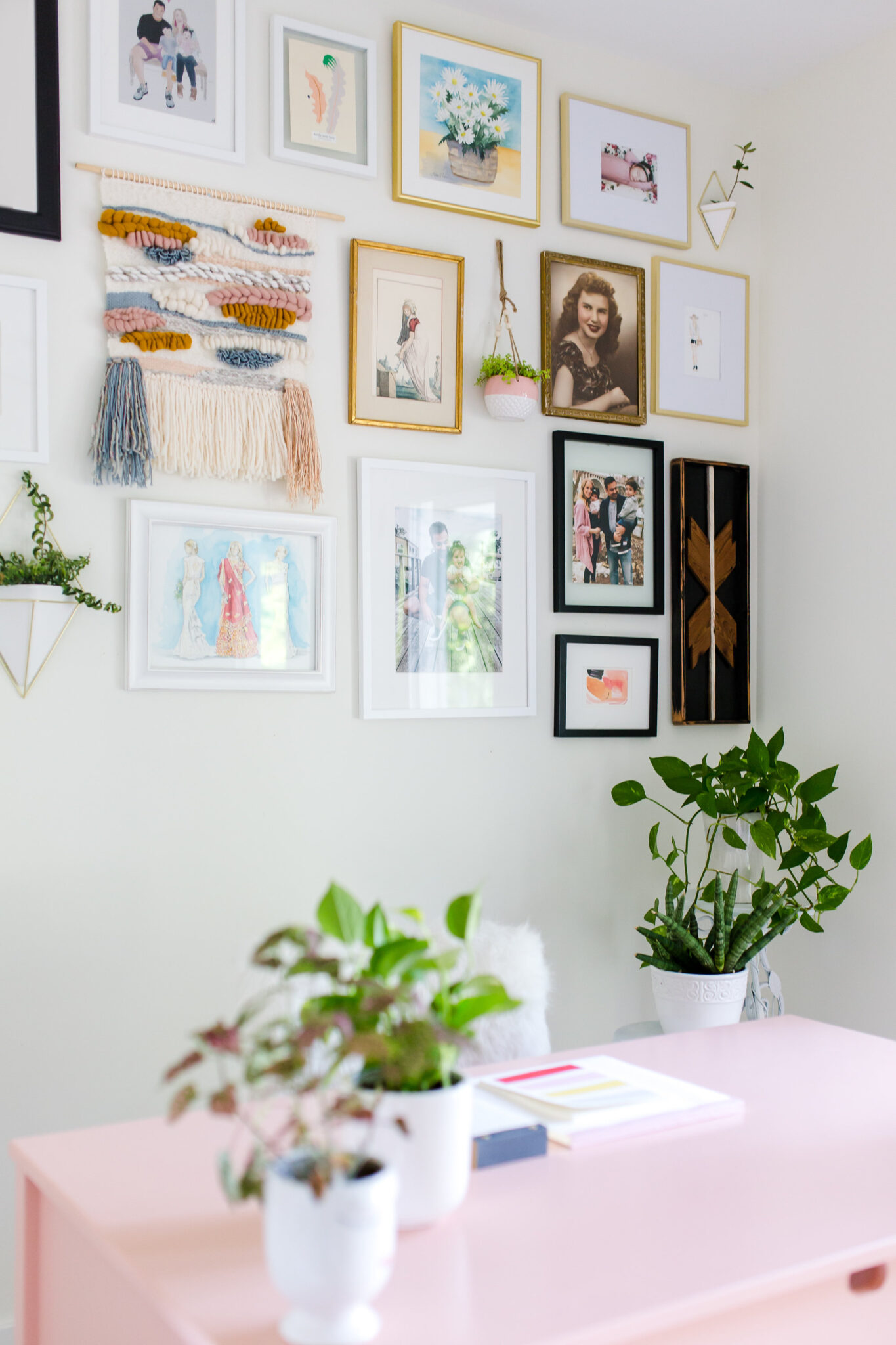 gallery wall with weave, reclaimed wood art and hanging plants