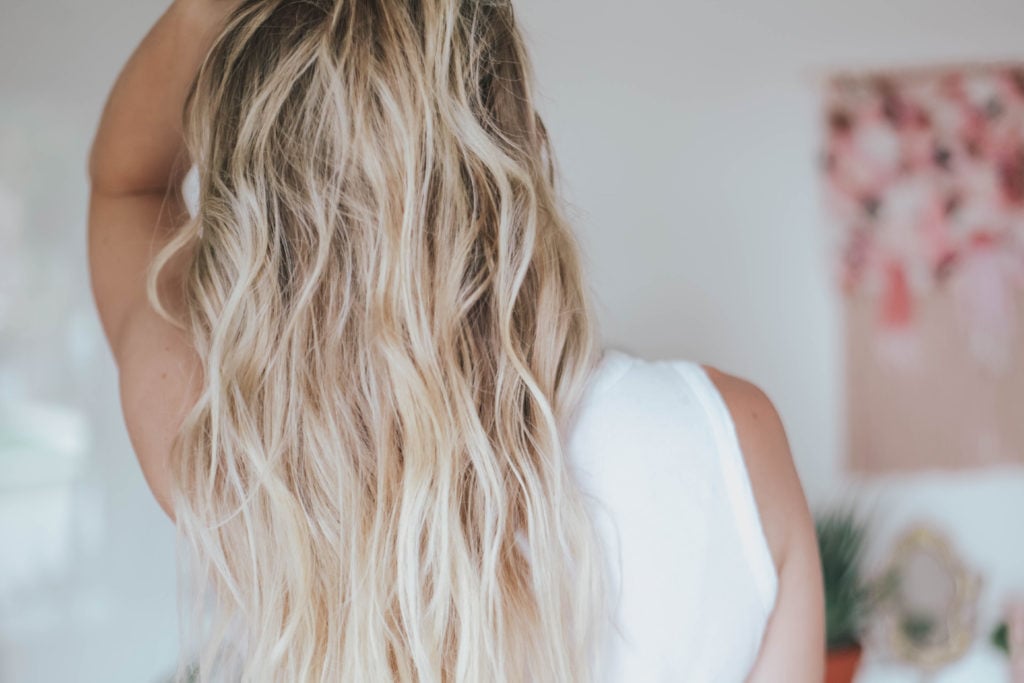 Woman with blonde hair - back of head