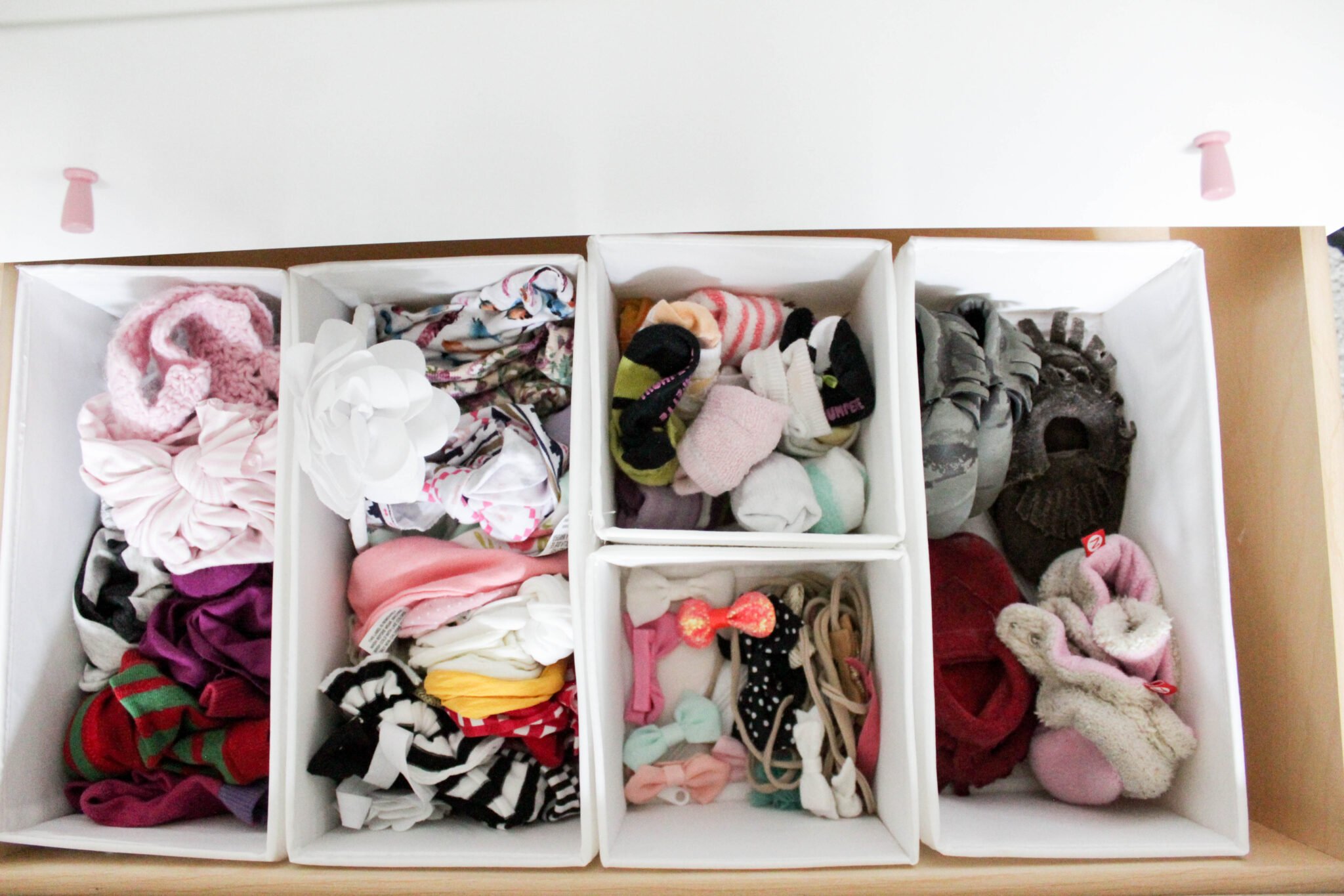 organizing baby's closet - dresser drawers with socks, shoes, bows