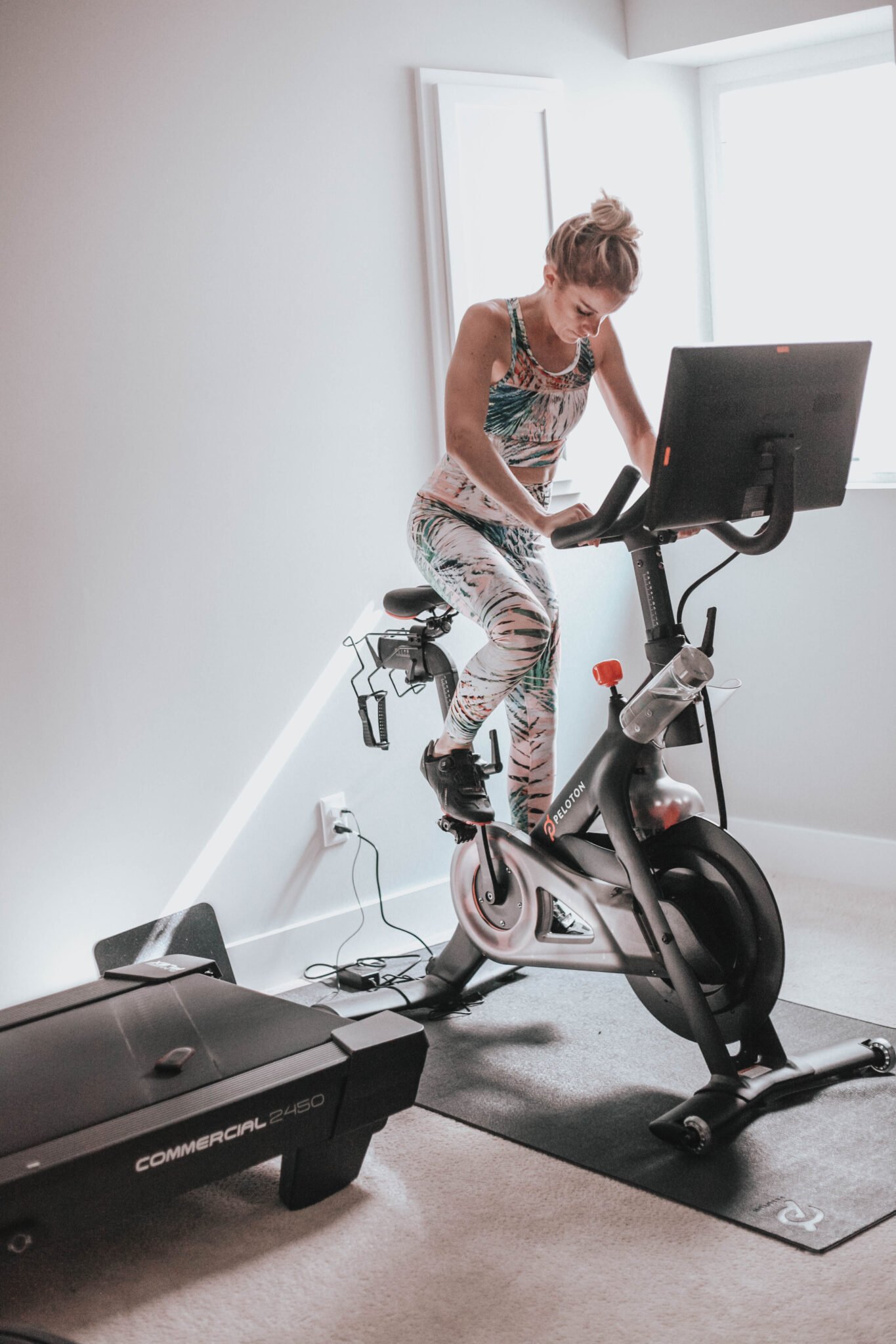 Is the Peloton worth it? peloton bike wearing a fabletics outfit