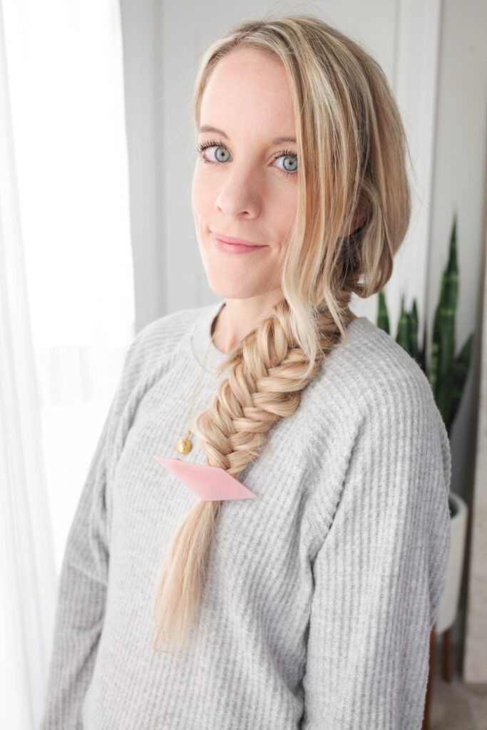 Woman with long blonde braid