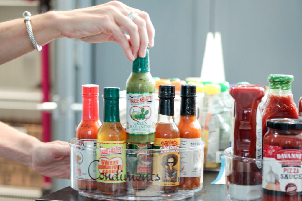 use lazy susan and labels to organize kitchen pantry