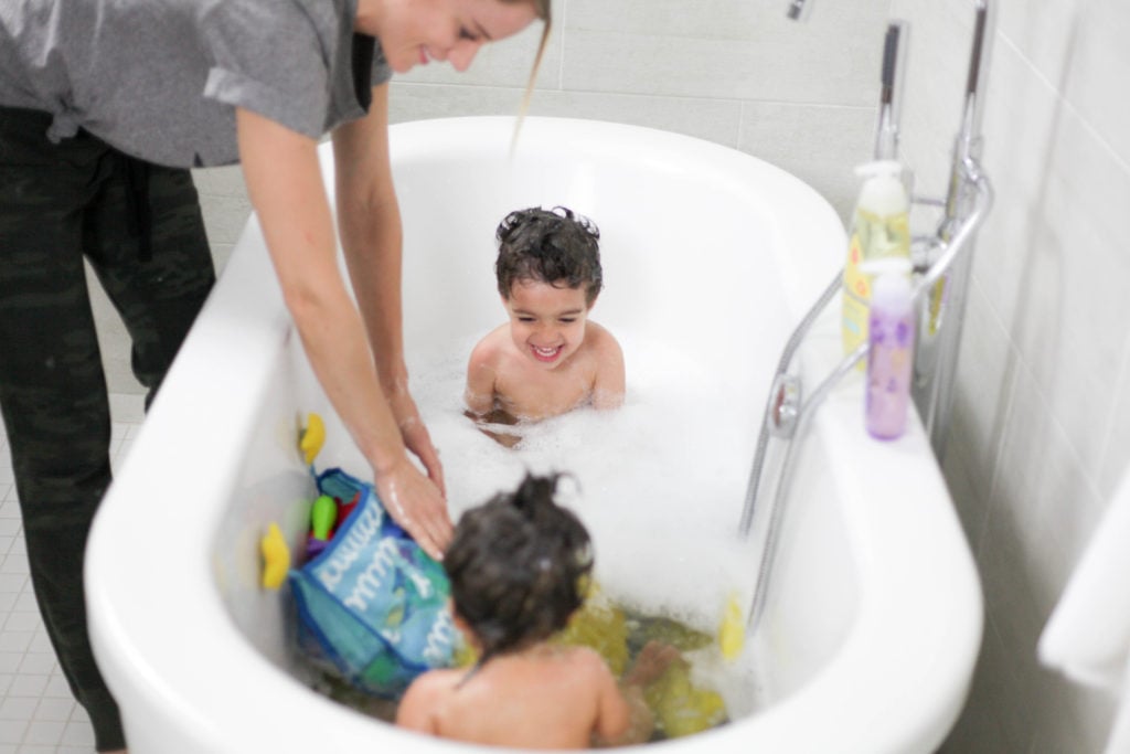 Utilize the bath for crabby kids - a favorite mom hack!