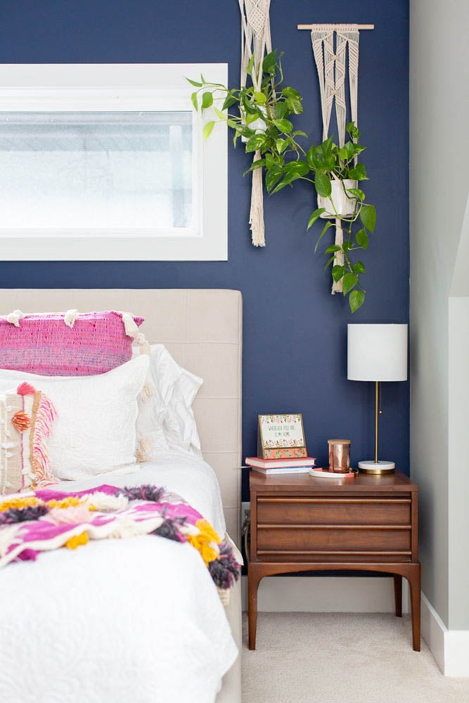 Navy Accent Wall Master Bedroom with Hanging Plants and Anthropologie bedding