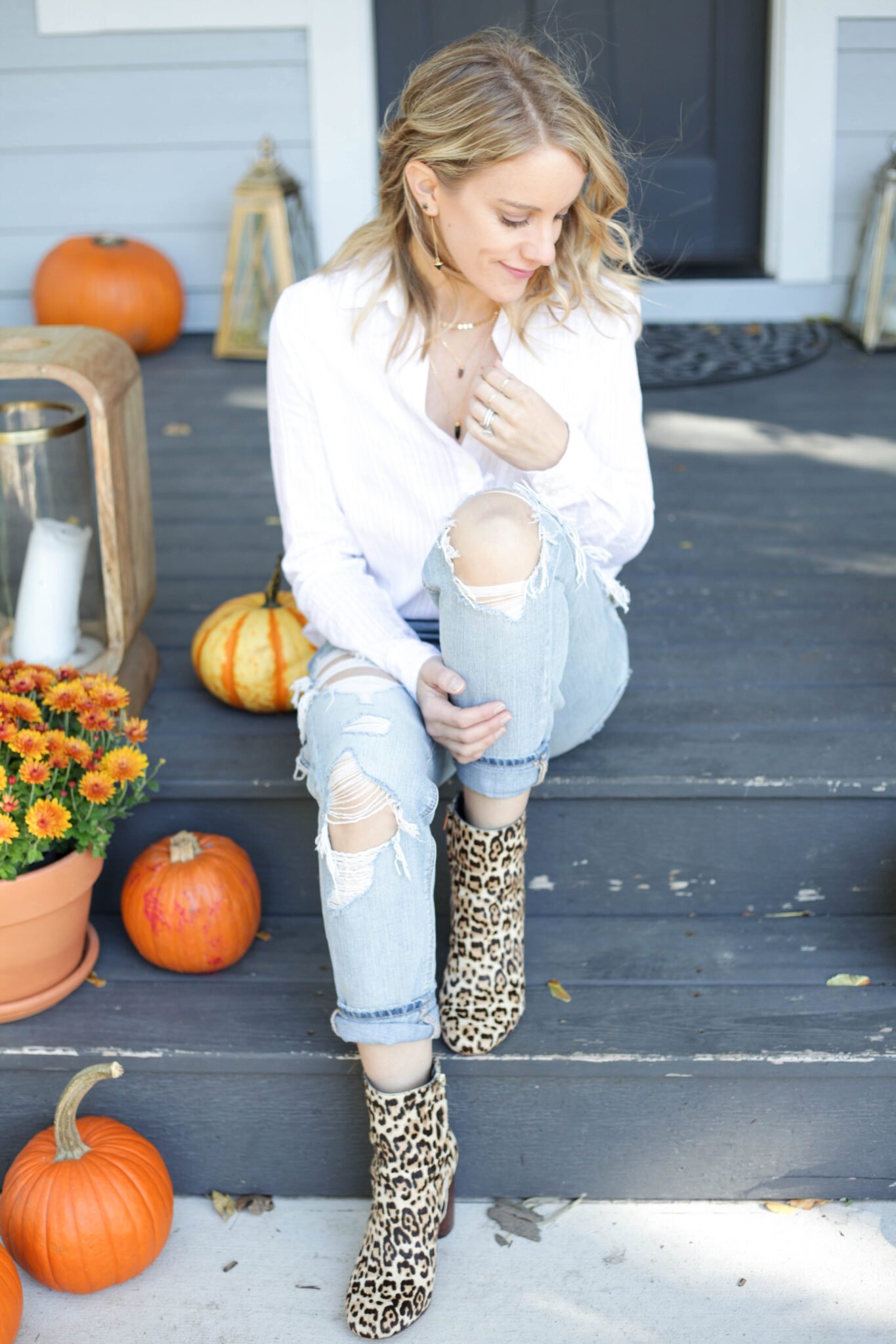 White button down with distressed denim