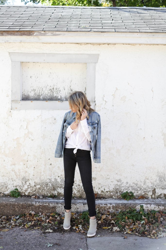 white button up shirt with black jeans and a denim jacket