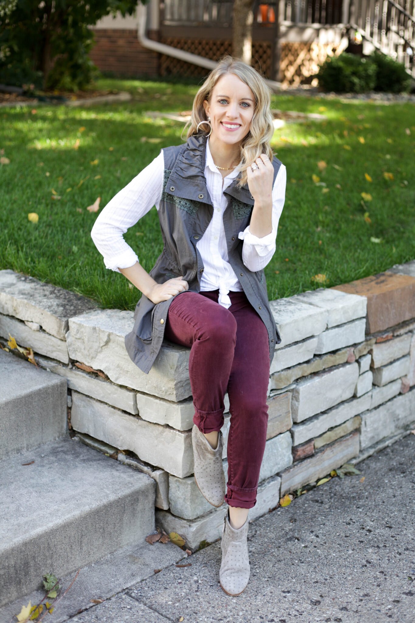 Button down shirt and burgundy pants with vest