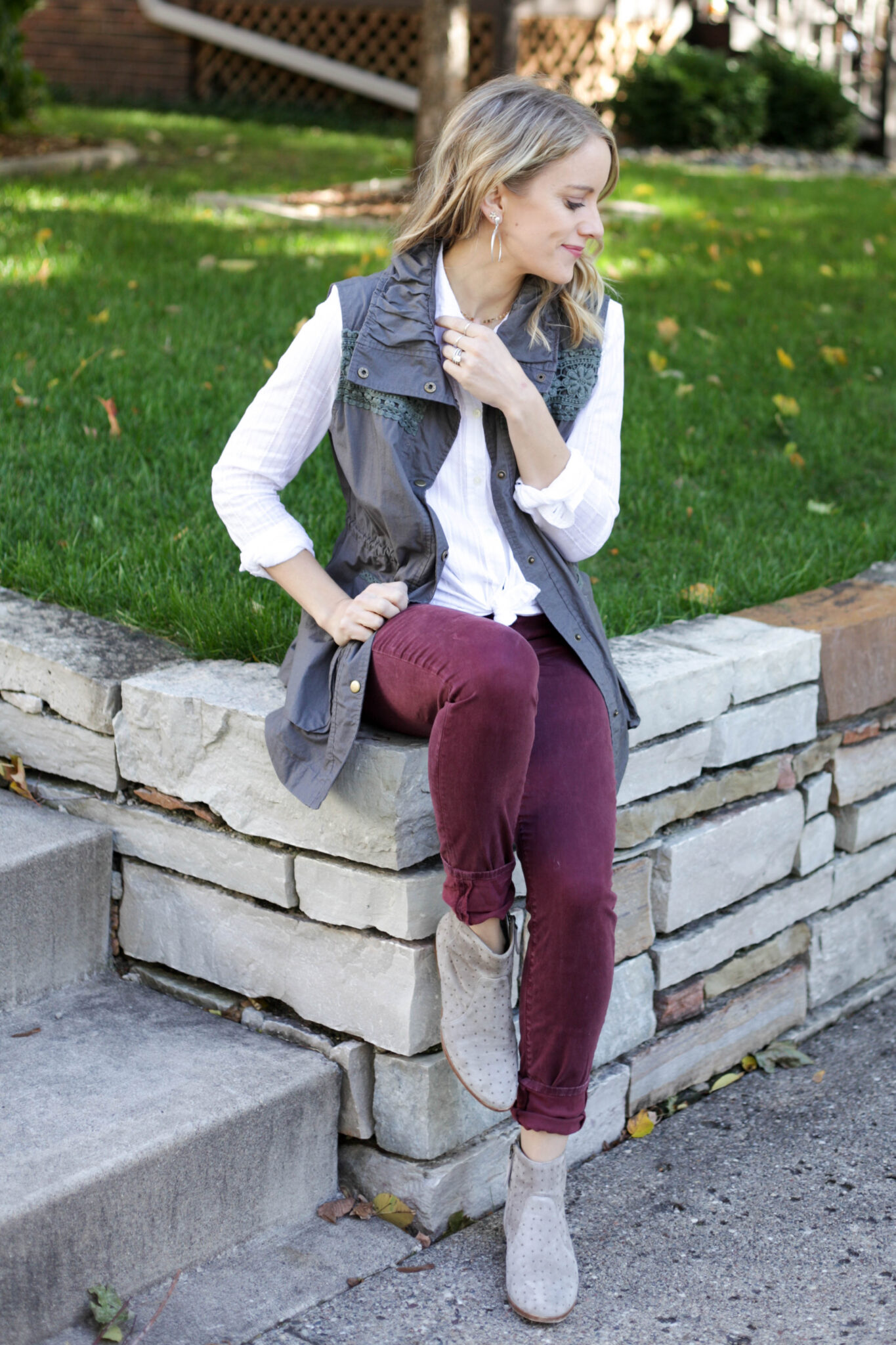 Button down shirt and burgundy pants with vest