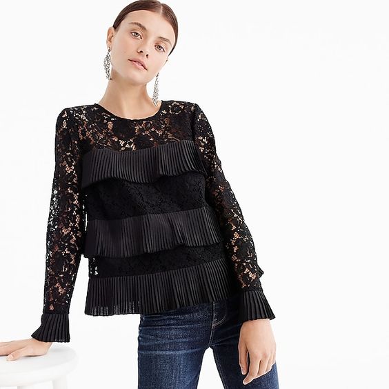Woman in long-sleeve lace tiered shirt