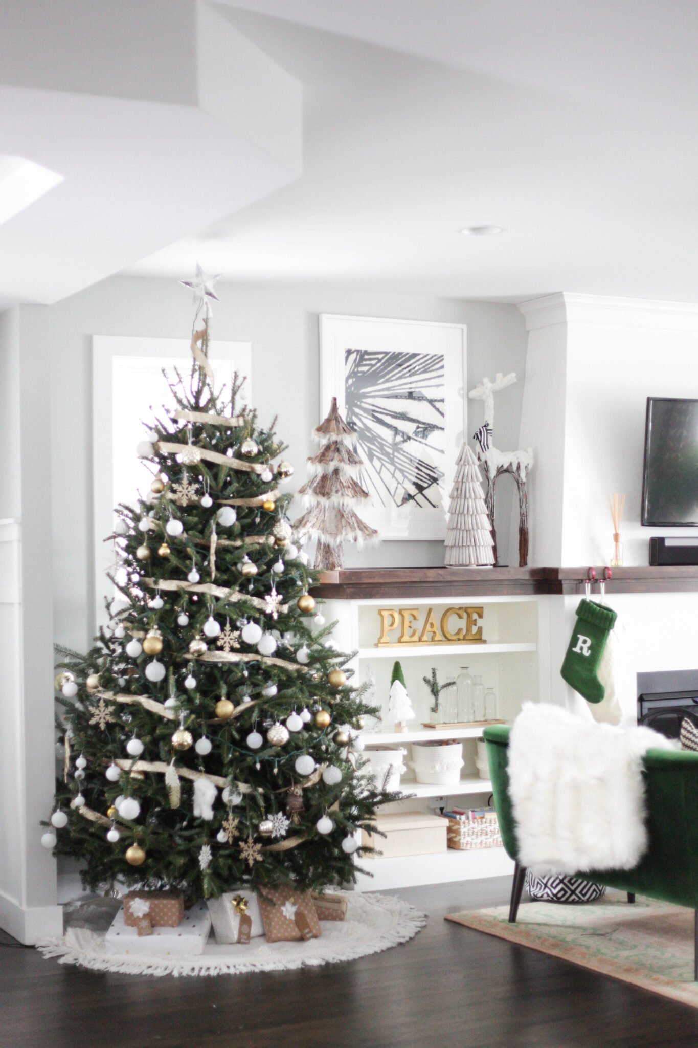 Living room with white and gold Christmas decorations