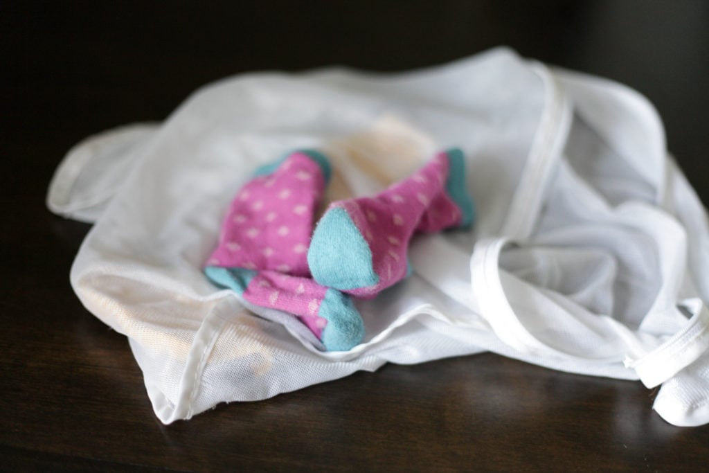 Put baby socks in a mesh zippered bag for easy folding! 