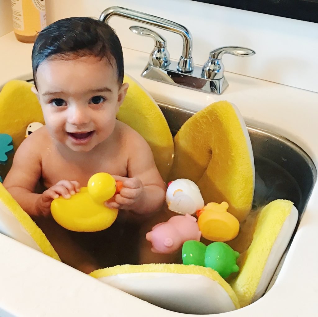 Top 10 Items You Need for a Baby - Blooming Bath in a sink