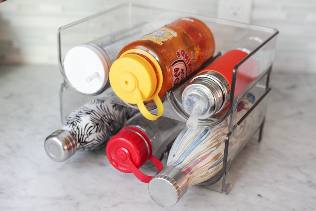 An easy home organization hack - stackable water bottle storage!