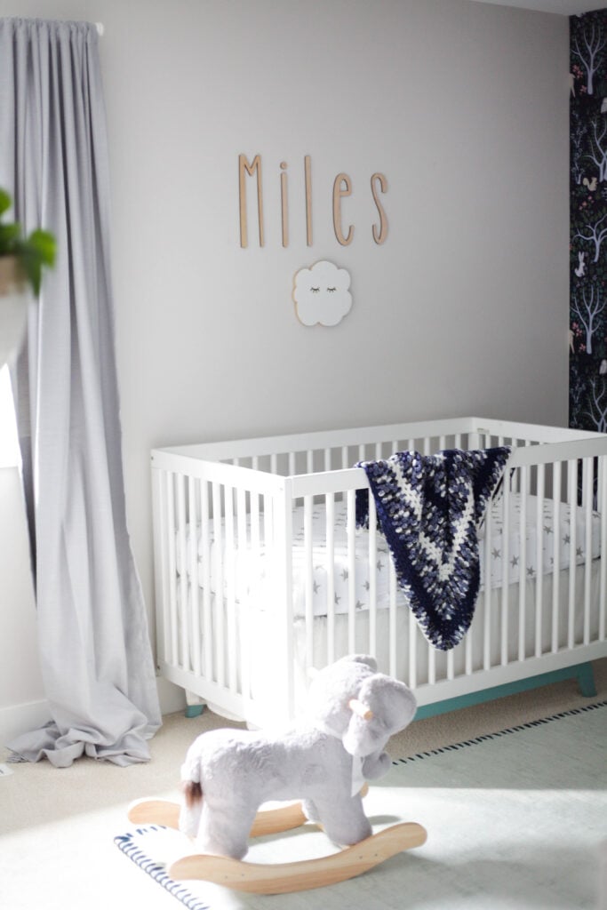 Simple baby boy nursery decor with Pottery Barn elephant rocker