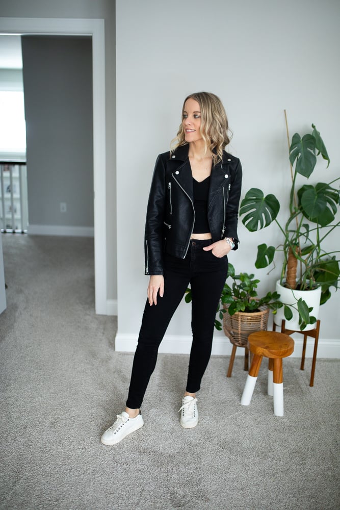 black pants, black jacket and white sneakers