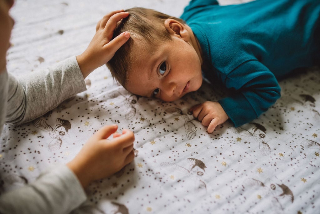 Tummy time on an aden + anais blanket