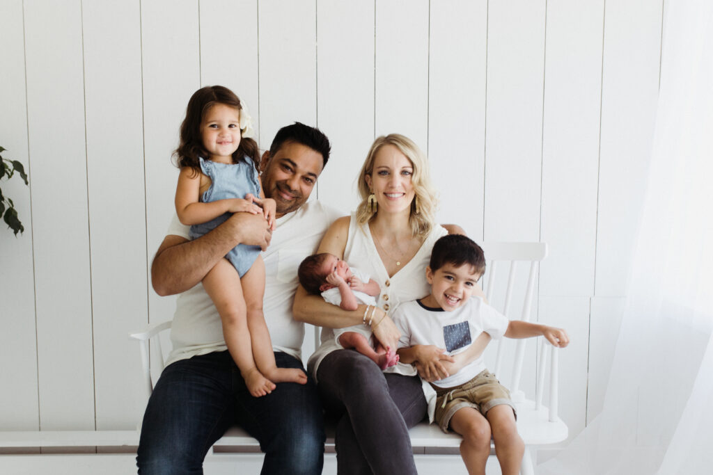 family with newborn baby