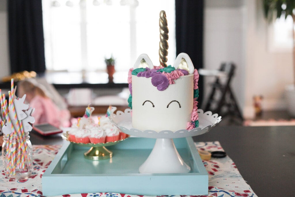 Pink, purple and teal unicorn birthday cake for a 1 year old birthday party