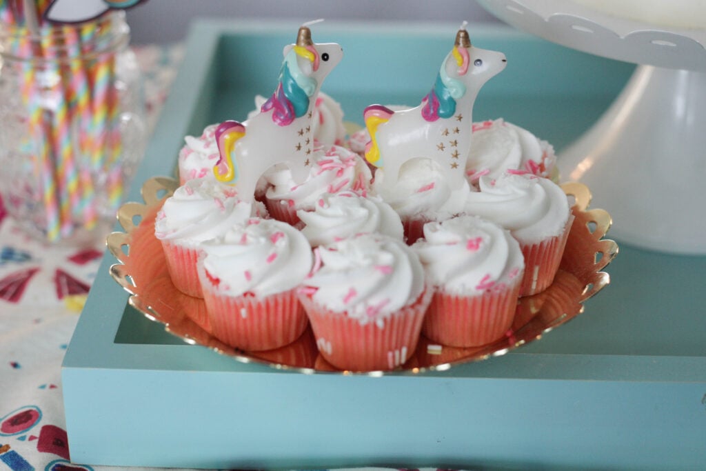 Simple funfetti cupcakes with unicorn candles for a 1 year old birthday party