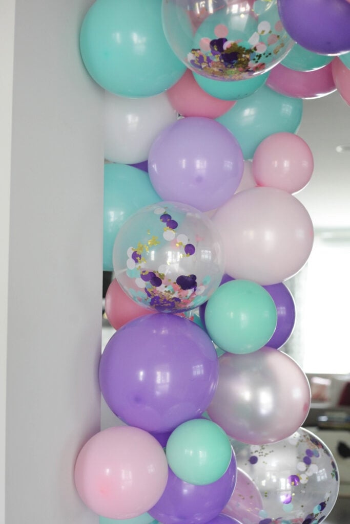 Confetti, pink, teal and purple balloon garland