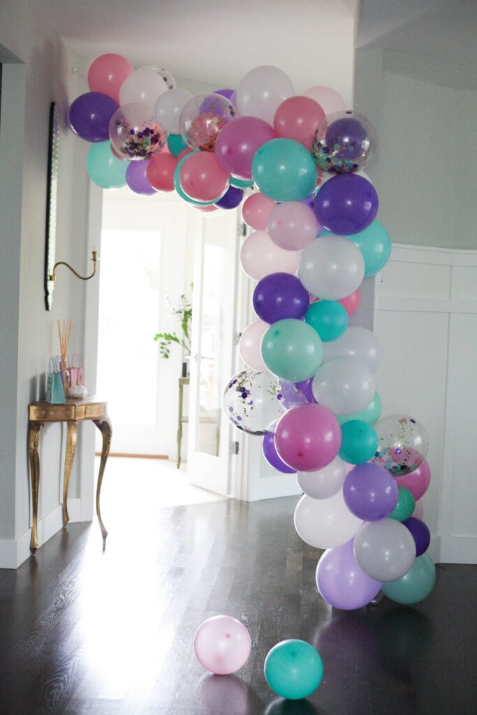 A multi color girly unicorn balloon arch