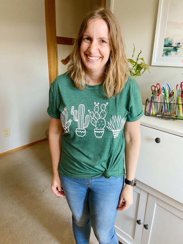 Woman wearing green cactus tee knotted