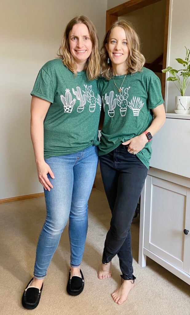 Two women wearing green cactus tee