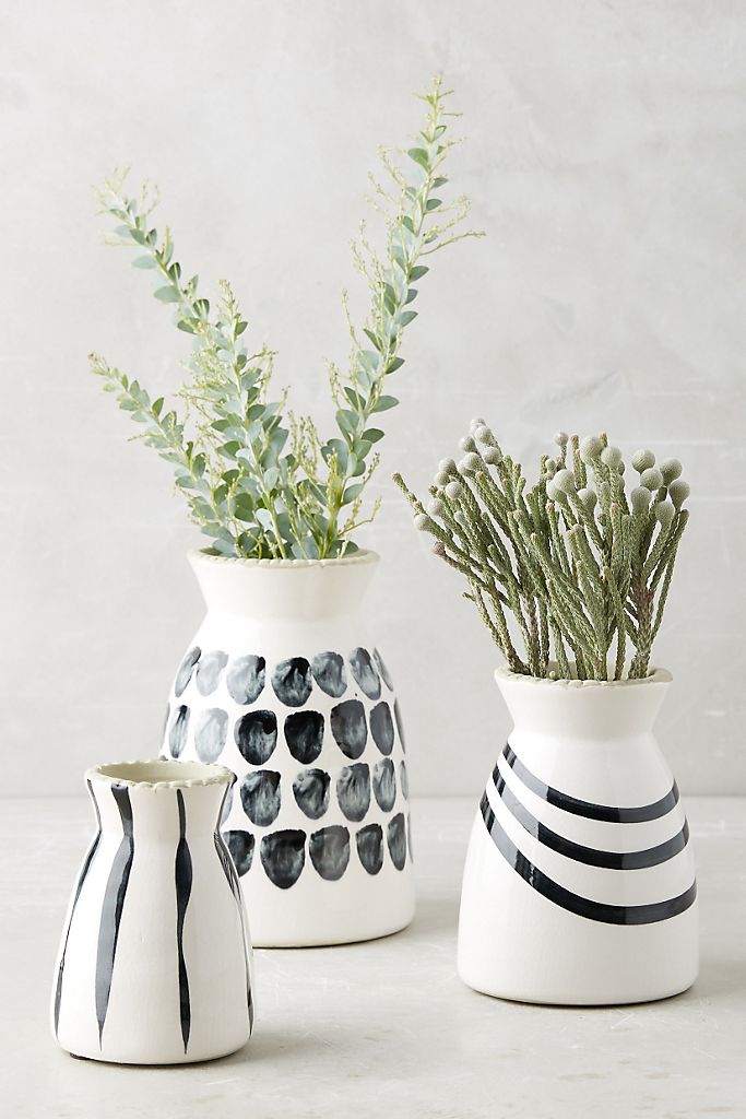 3 vases of different sizes with painted patterns