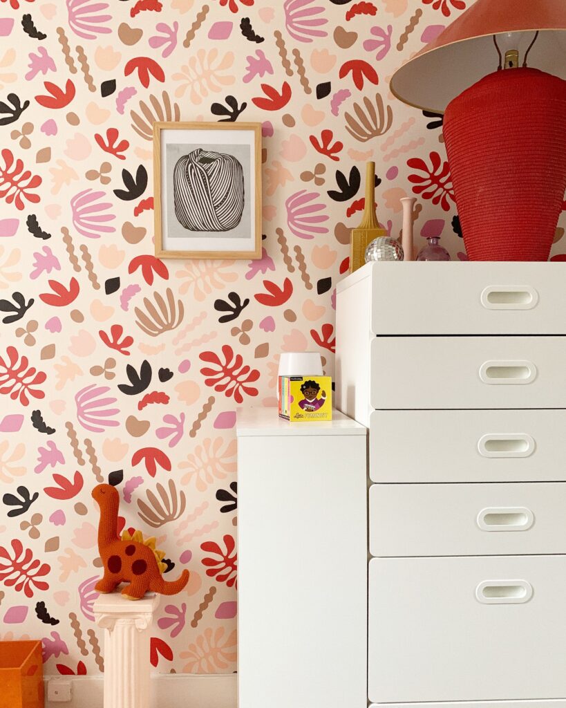 Kids room with abstract floral/shapes wallpaper