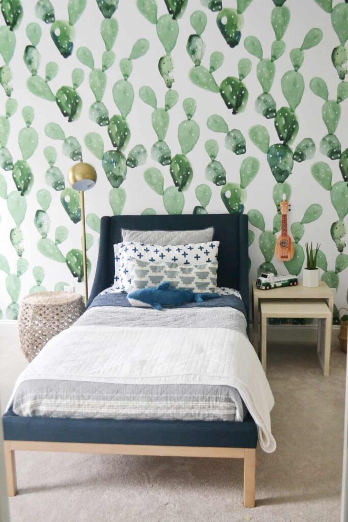 Bedroom with watercolor cactus wallpaper