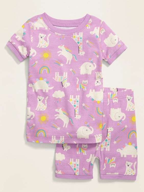 Pink pajamas with animals and rainbows