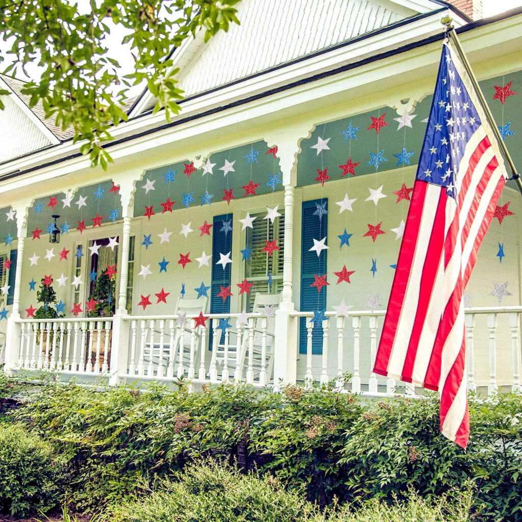Red white and blue star streamers on a porch