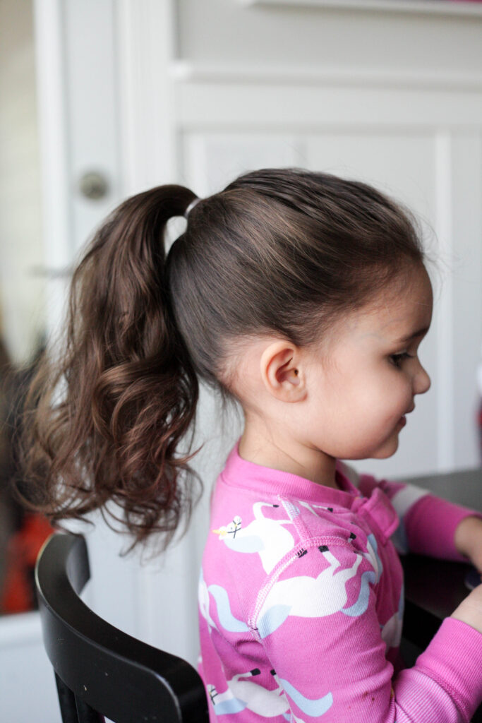 little girl with ponytail