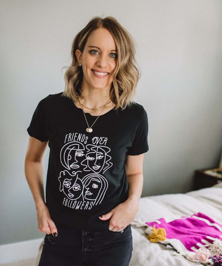 woman wearing black and white graphic tee