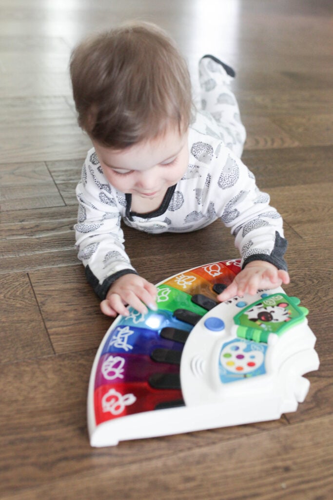 Baby Einstein piano on floor from Around We Grow toy