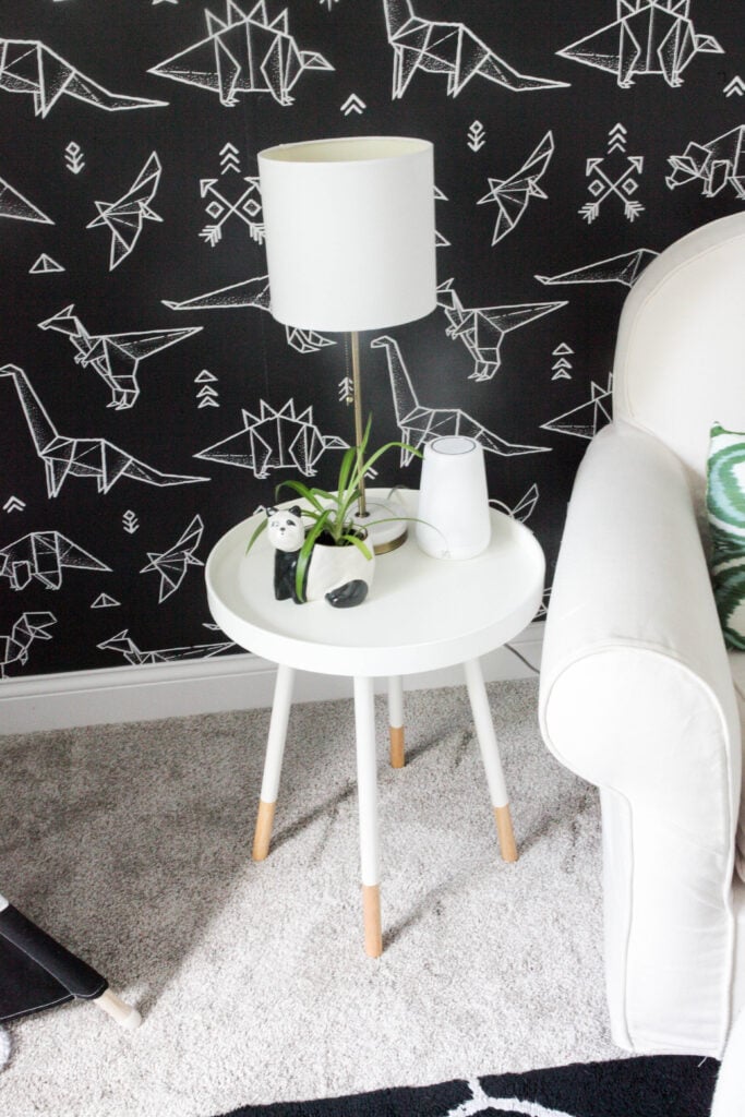 Side table with black and white decor in kids room