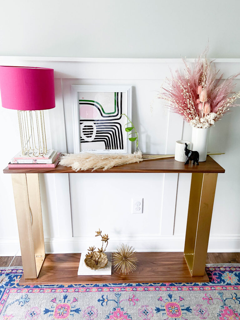 Pink themed console table decor