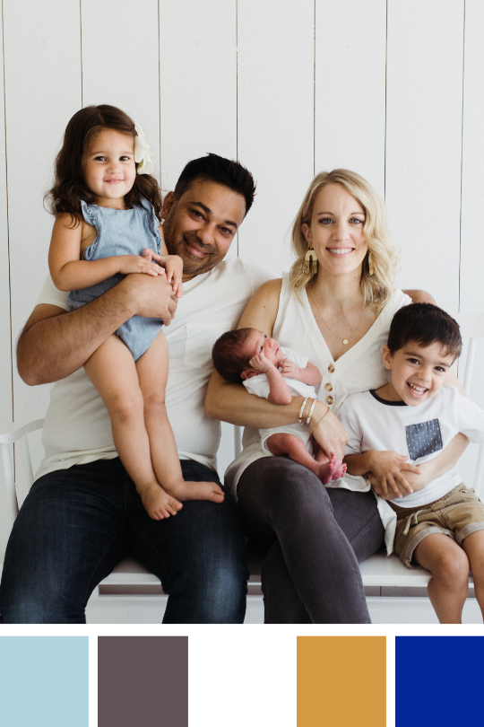 Family in a white, blue and mustard color palette