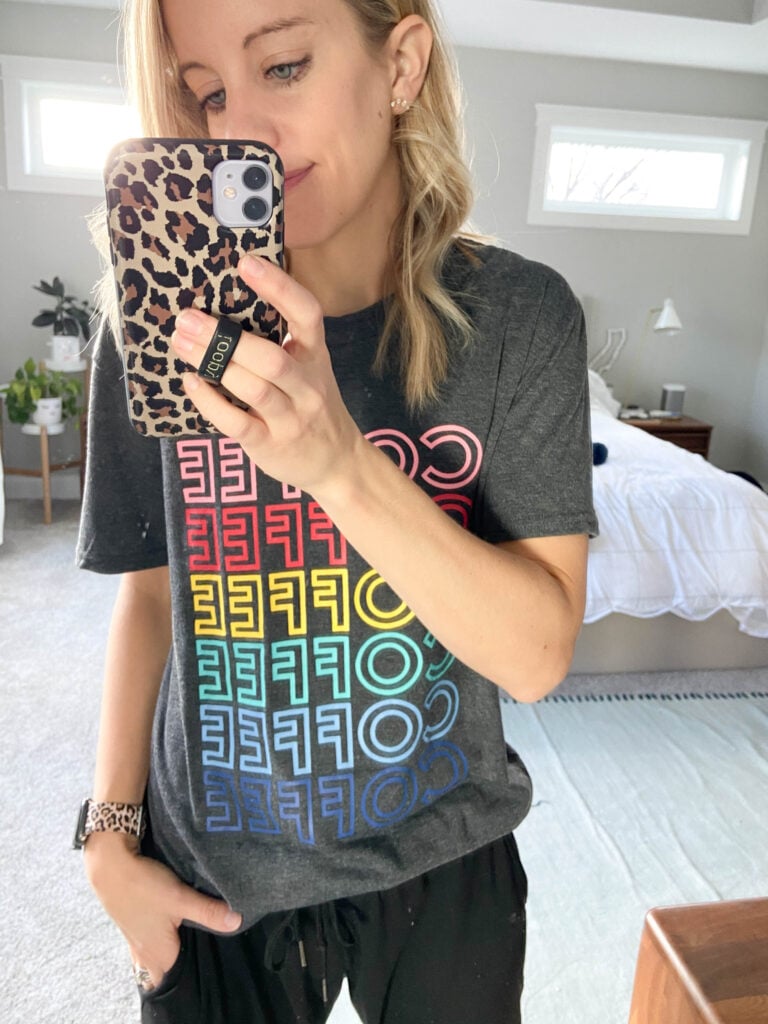 woman wearing coffee graphic tee