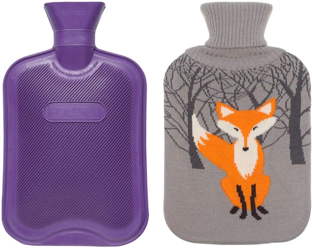 Purple hot water bottle with knit fox cover