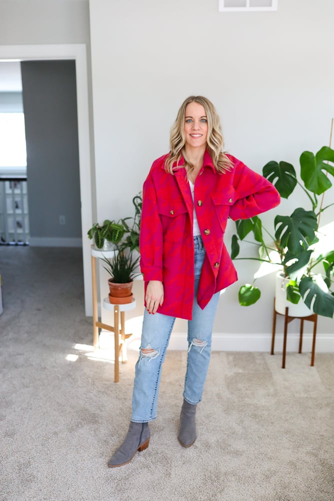 pink and red shacket and straight leg jeans outfit