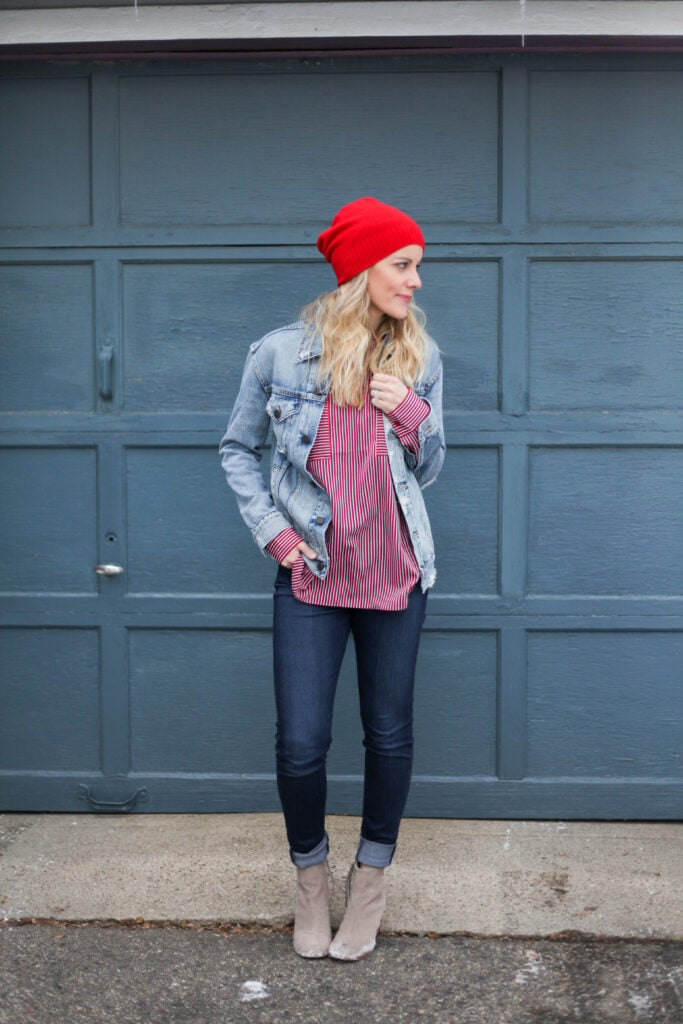 denim jacket outfit with red hat