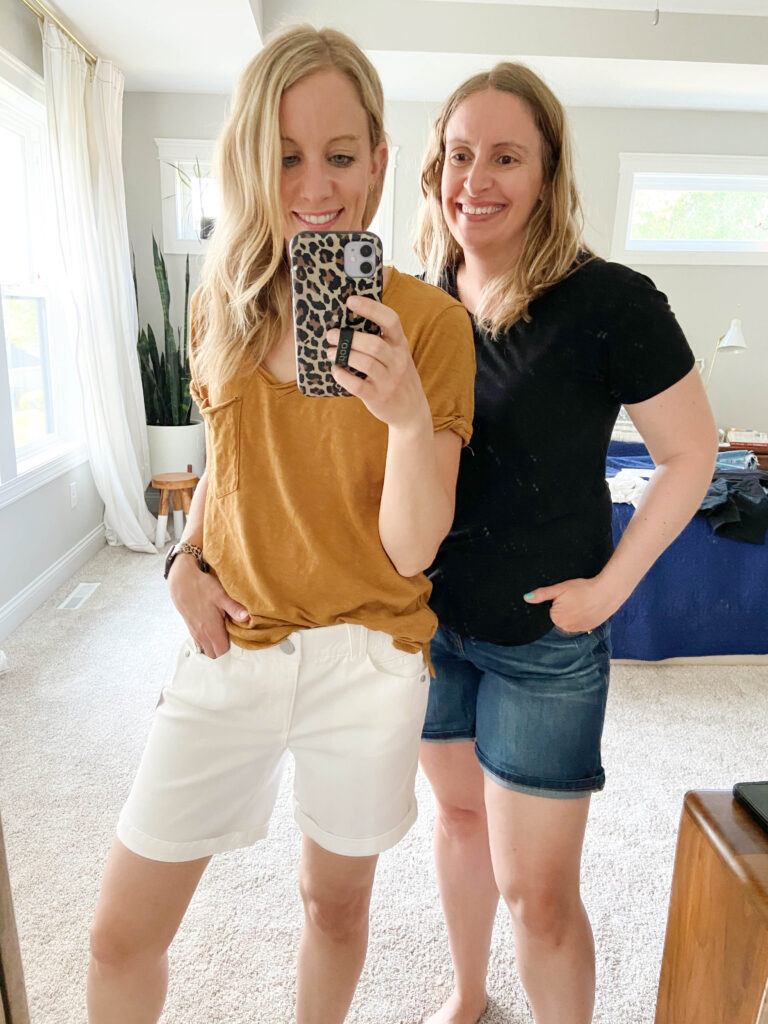 Two women wearing 5-inch inseam denim shorts in white and blue