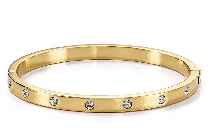 Gold bangle with small white gems