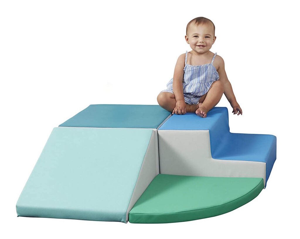 Baby playing on Softscape play structure