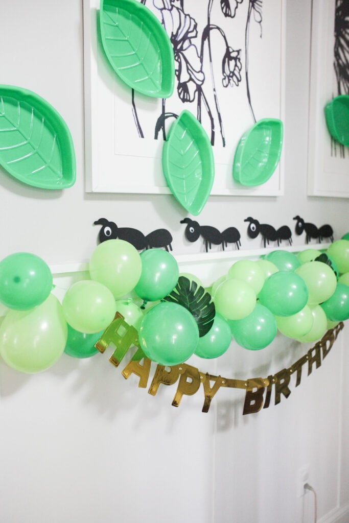 Bug decorations and balloon garland