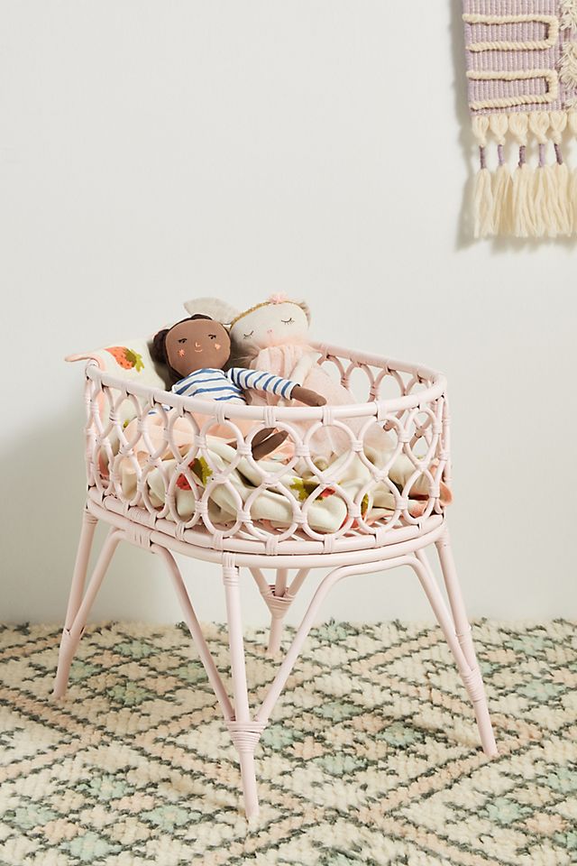 Pink wicker doll bassinet