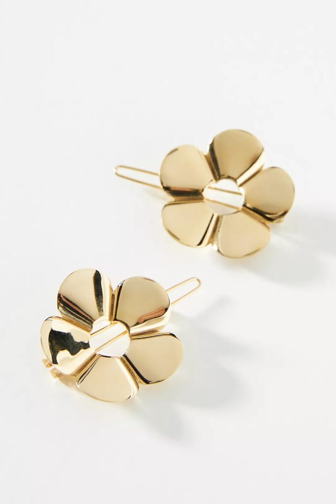 2 Gold flower barettes