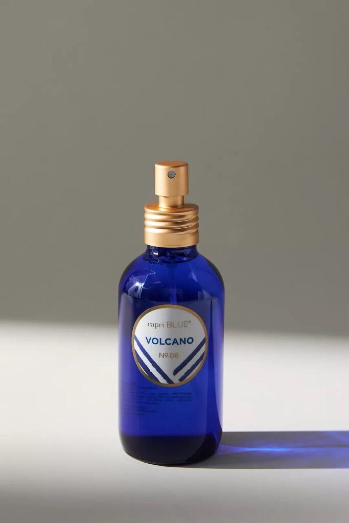 Blue bottle of Volcano room spray